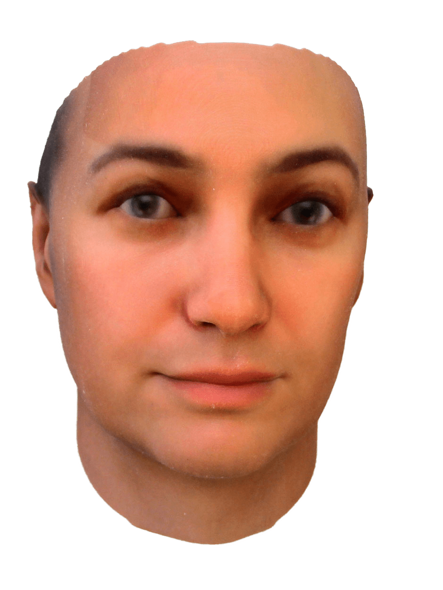 Photo of a 3D printed face of a woman with white skin and brown eye colour on the left - against a white background