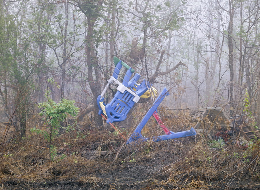 Photo of a swing set fallen over 