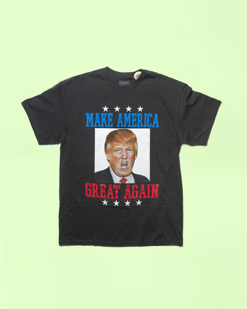 Photo of a T-shirt with a picture of Trump and the text ‘Make America Great Again’
