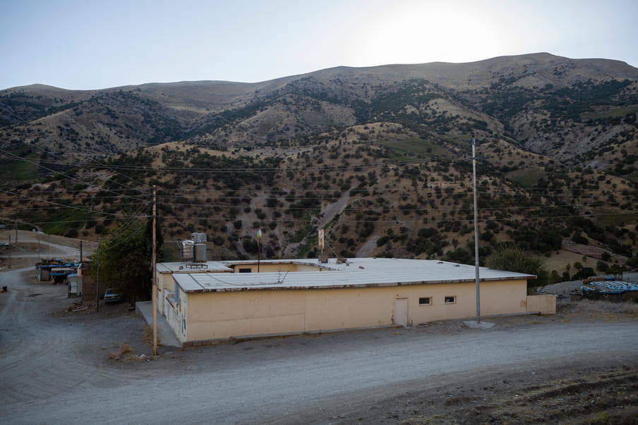 Photograph of a building in a valley