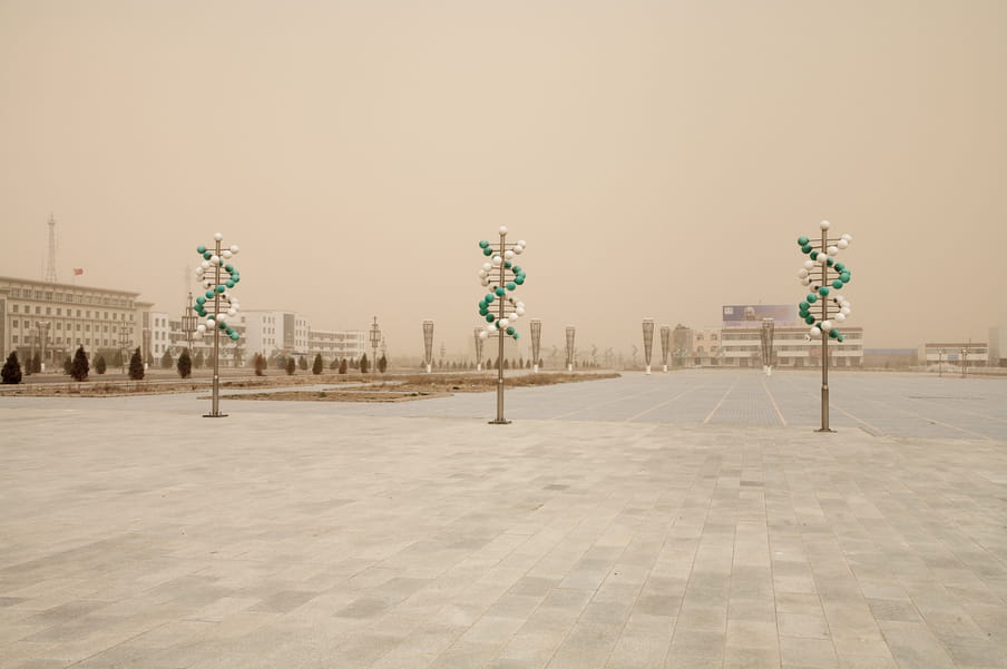 View of an empty public space. The image as a yellow tint. 