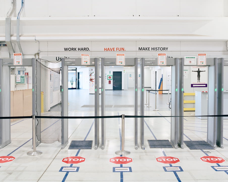 Colour photograph of an entrance with security devices.