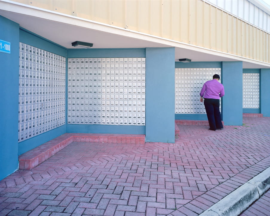 Picture of a street with many mailboxes