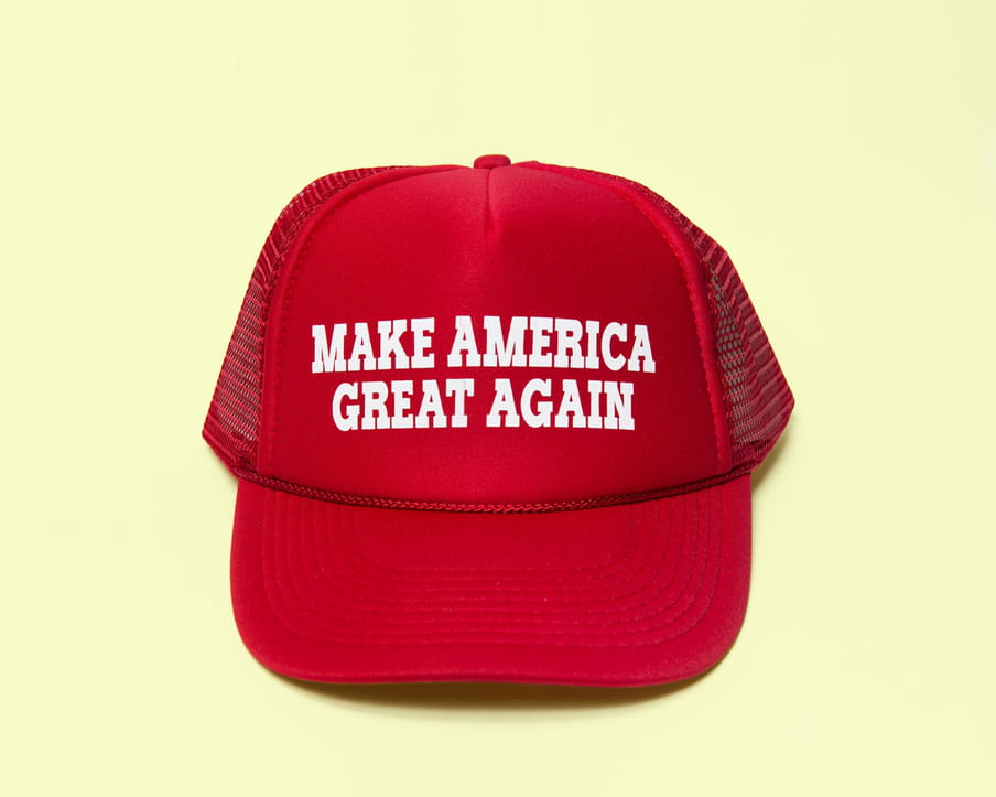 Photo of a red cap with the text ‘Make America Great Again’