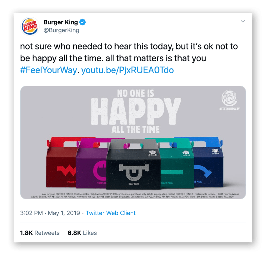 Screenshot of a tweet by Burger King showing a commercial stating "not sure who needed to hear this today, but it’s ok not to be happy all the time. All that matters is that you #FeelYourWay." It also shows an image with their products and the text "No one is happy all the time".