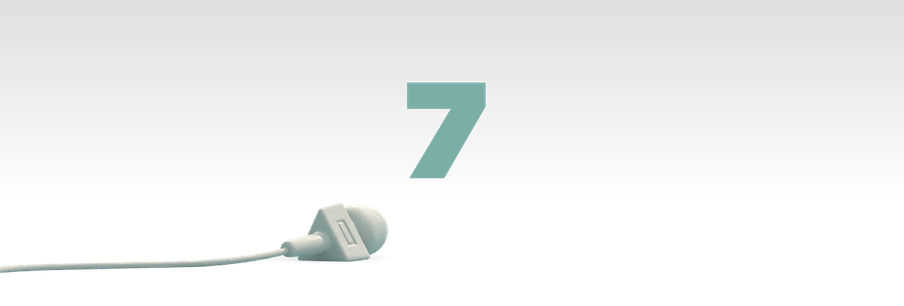 Illustration of the number seven in green with a mic laying in front of it 