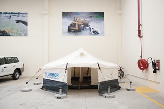 A UNHCR tent, set up to serve as a showroom model. Pieter van den Boogert for The Correspondent