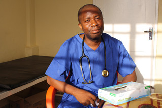 Dr. Mark Ali at his desk.  Photo by Hazel Healy