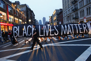 Police officer during a Black Lives Matter demonstration in New York City on July 8, 2016. Photo by Kena Betancur / AFP