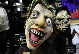 A Halloween mask depicting US Secretary of State Hillary Clinton is displayed at a store in Silver Spring, Maryland, on October 28, 2010. Photo: Jewel Samad / AFP