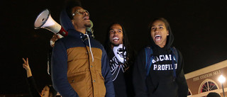 Ferguson activist Darren Seals, center, awaits the grand jury decision on whether to indict Darren Wilson in the death of Michael Brown. Photo by Robert Cohen / St. Louis Post-Dispatch via AP